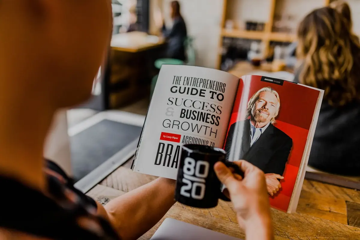 Posture coach guiding a small group of office workers through a stretch